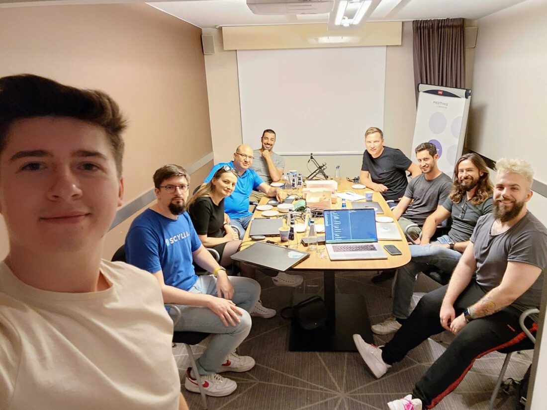 ScyllaDB-employees-in-conference-room