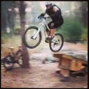 Photo: Vlad Zolotarov jumping his mountain bike off a ramp.